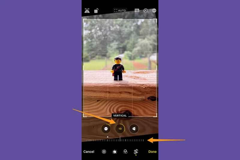 iPhone 照片應用程式處於編輯模式，示範如何調整垂直透視。