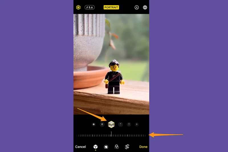 iPhone 照片應用程式處於編輯模式，示範如何編輯人像模式的光效。